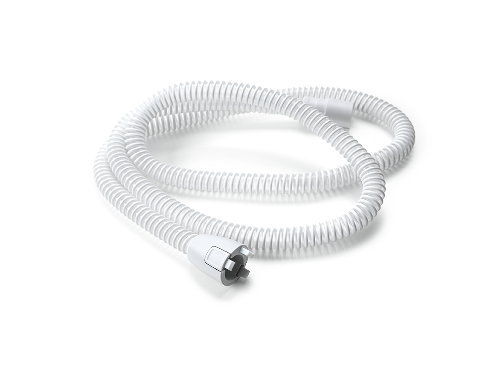 un tuyau flexible blanc sur fond noir